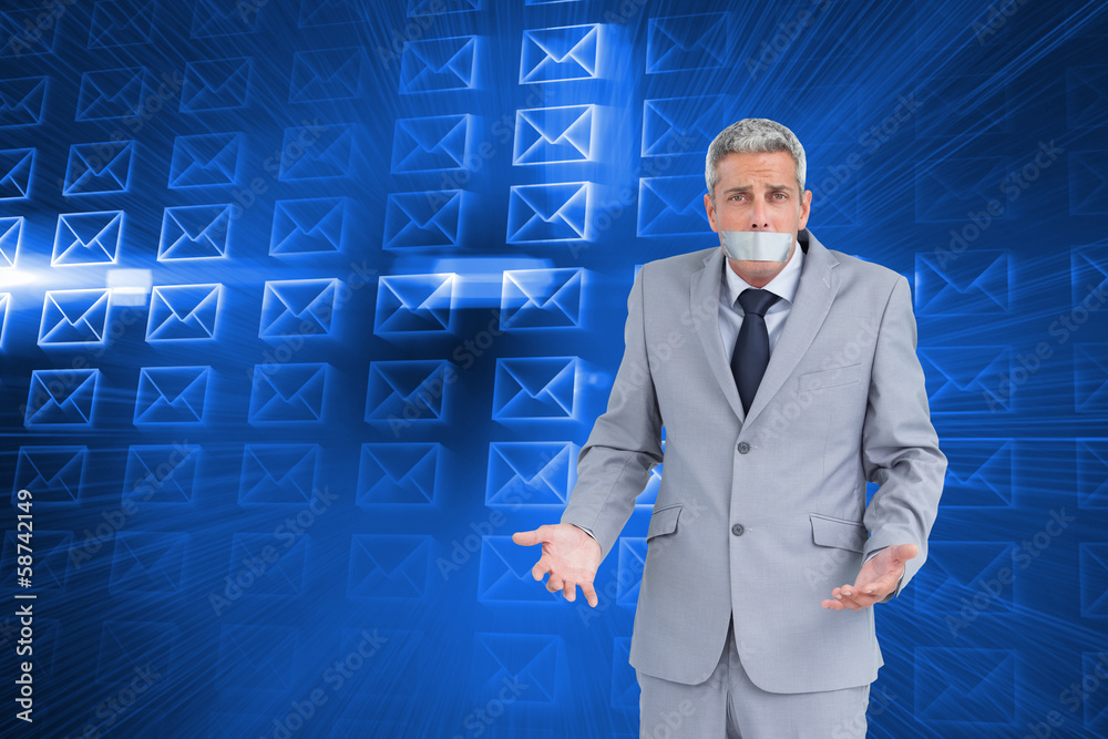 Composite image of businessman gagged with adhesive tape on mout Composite image of businessman gagged with adhesive tape on mout