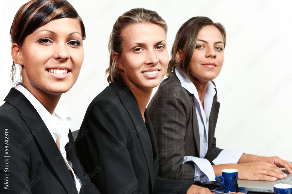 portrait of a team of three young business women portrait of a team of three young business women