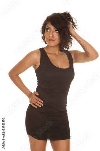 woman black short dress hand hair
