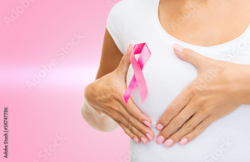 Wallpaper Mural woman with pink cancer awareness ribbon Torontodigital.ca