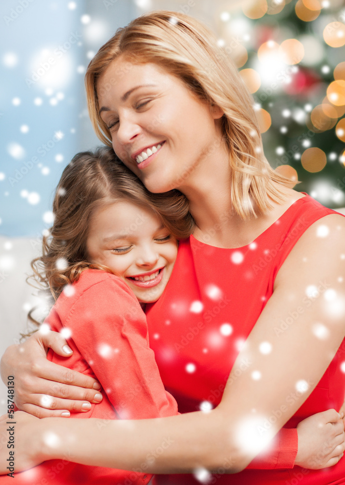 hugging mother and daughter