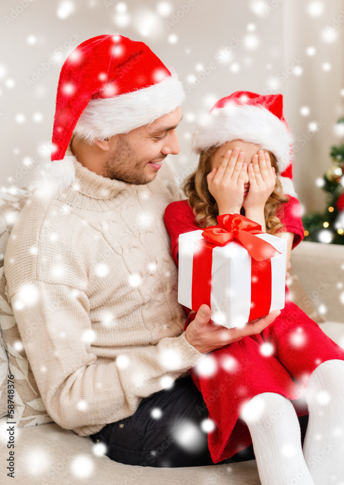 smiling daughter waiting for a present from father smiling daughter waiting for a present from father