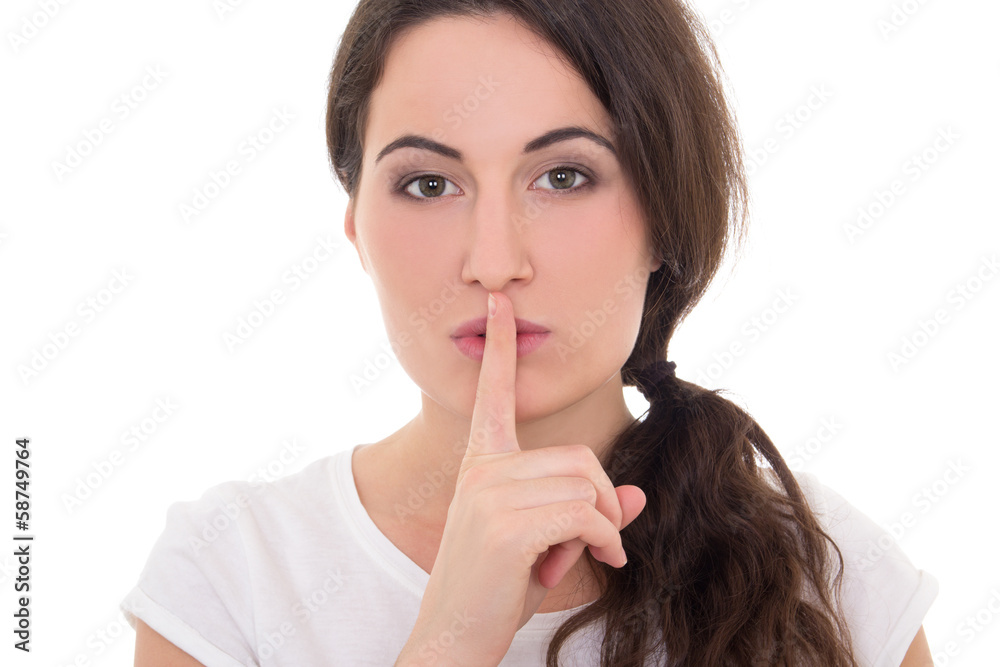 young woman with finger on lips isolated on white young woman with finger on lips isolated on white