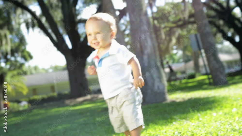 Cute Little Caucasian Boy First Steps Outdoors Park Cute Little Caucasian Boy First Steps Outdoors Park
