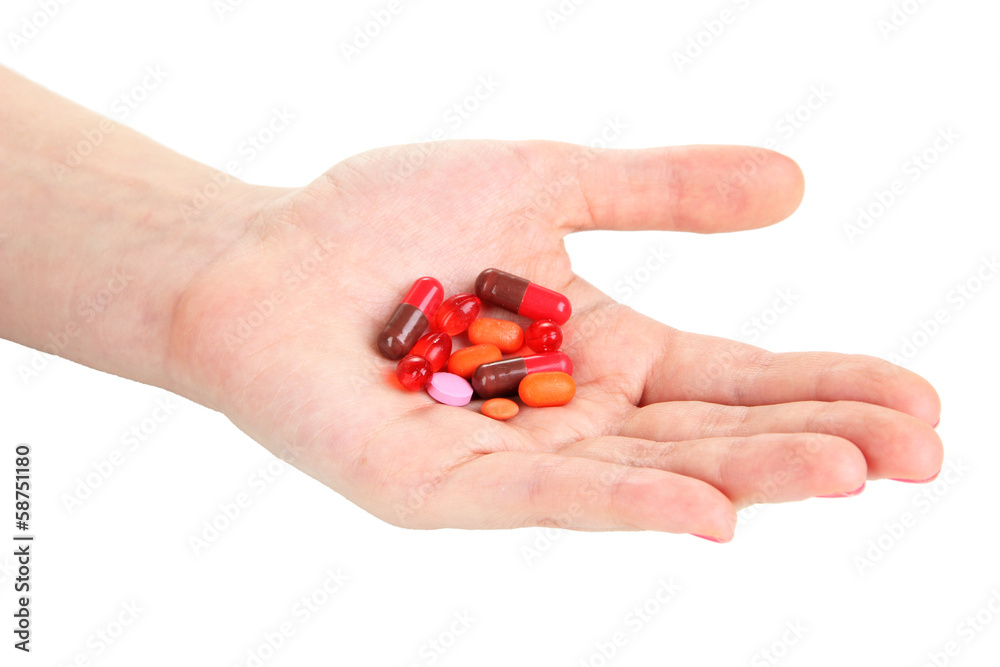 Pills in hand isolated on white Pills in hand isolated on white