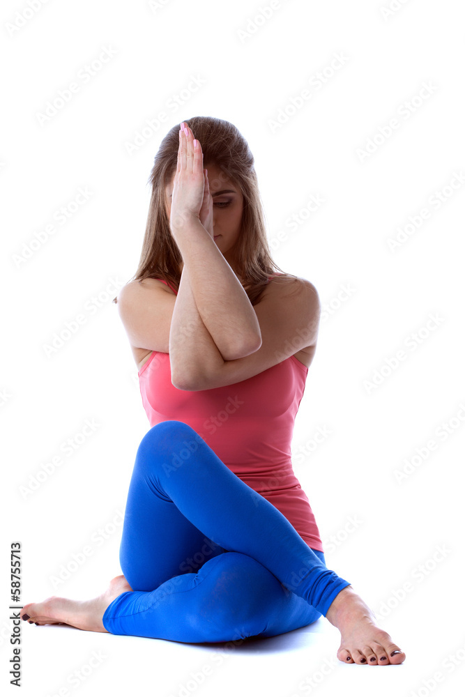 Lumped young woman meditates, isolated on white