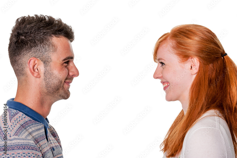 Couple in profile smile at each other Couple in profile smile at each other