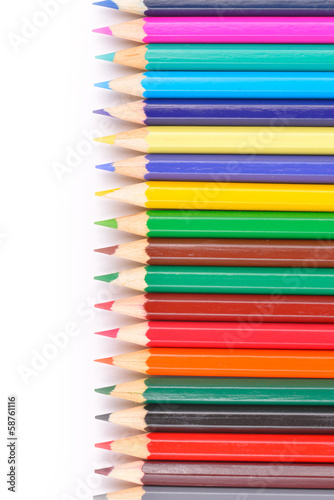 Colored pencils isolated on white background