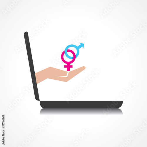 hand holding male and female symbols comes from laptop screen