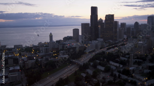 Aerial sunset view Seattle office skyscrapers city Highway 5, USA photo