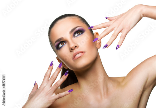 Beautiful woman close up over white background with nails