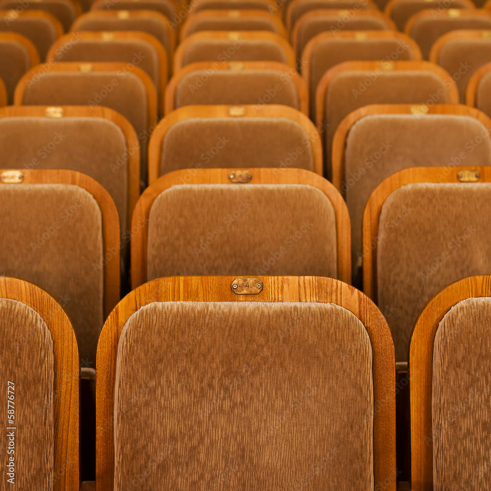Obraz premium Rows of seats in theater in the background