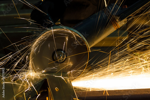sharpening and cutting of iron by abrasive disk machine
