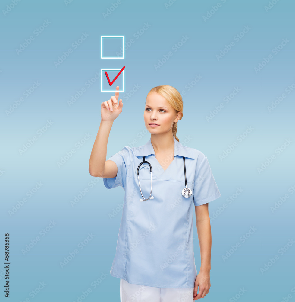 doctor or nurse drawing checkmark into checkbox doctor or nurse drawing checkmark into checkbox