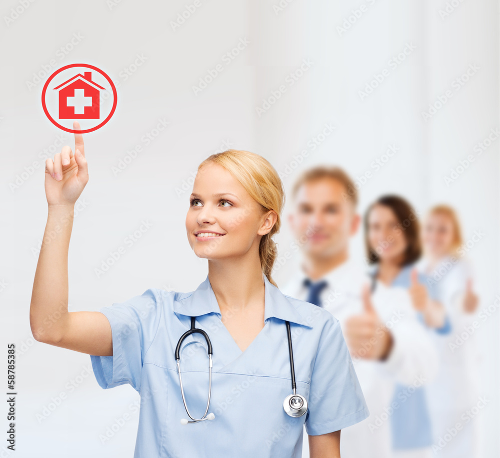 smiling doctor or nurse pointing to hospital icon smiling doctor or nurse pointing to hospital icon