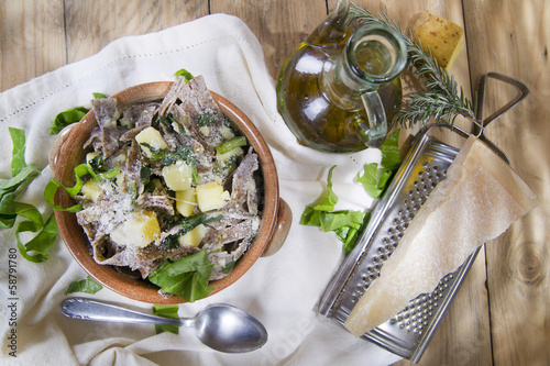 Traditional dish of the Valtellina Italy, Pizzoccheri photo