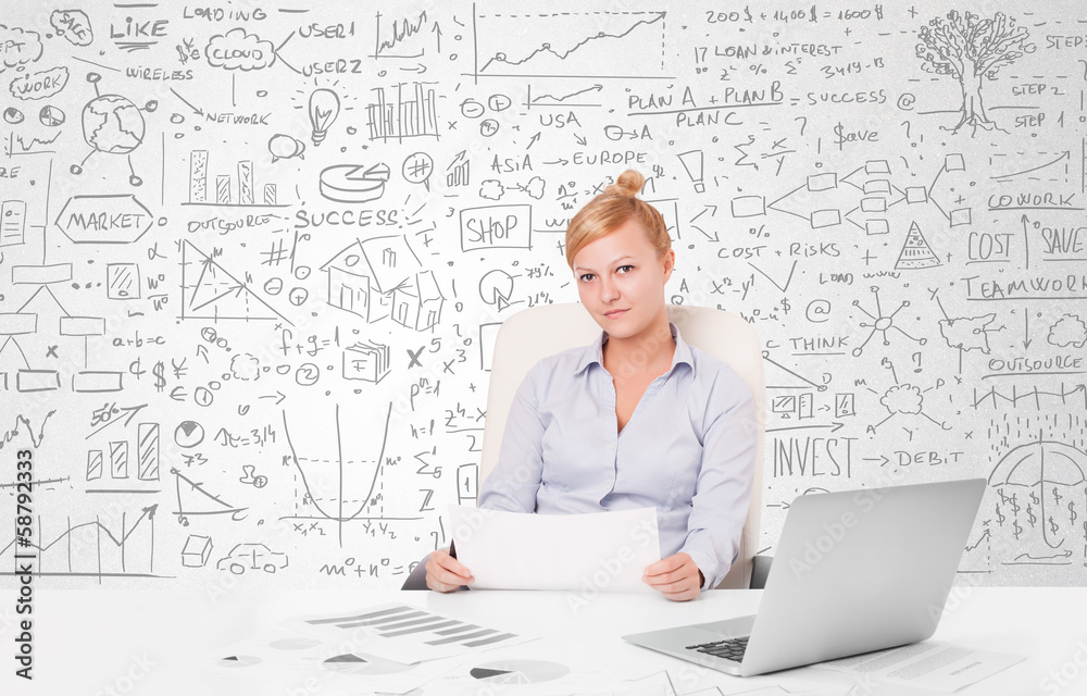 Pretty businesswoman planning and calculating various business i Pretty businesswoman planning and calculating various business i