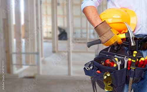 Worker with a tool belt.