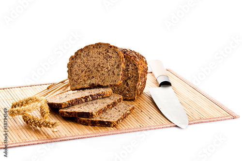  Brown seed biobread isolated on white background photo