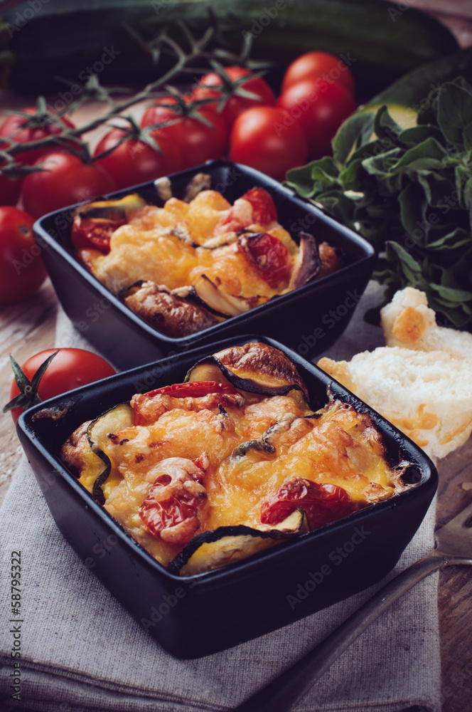 Two dishes of vegetable casserole Two dishes of vegetable casserole