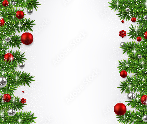 Christmas background with fir branches and balls.