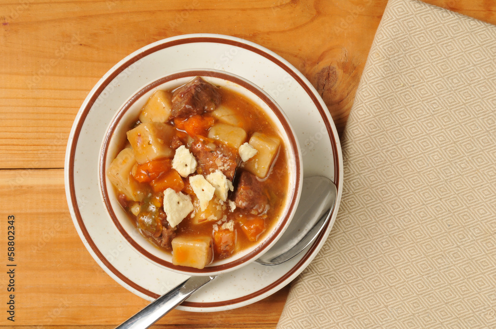 Cup of soup on wood Cup of soup on wood