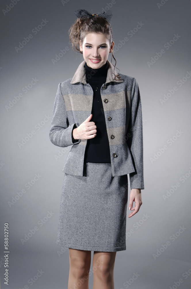 Attractive young fashion model posing in the studio Attractive young fashion model posing in the studio