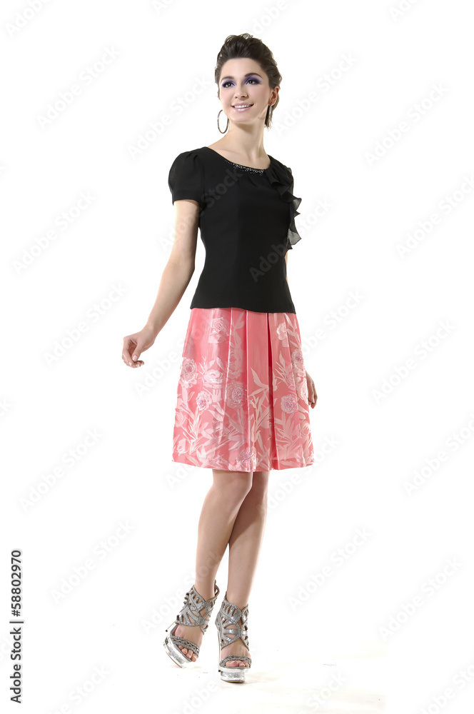 Full length fashionable girl posing in the studio Full length fashionable girl posing in the studio