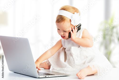 baby girl with computer laptop,  mobile phone