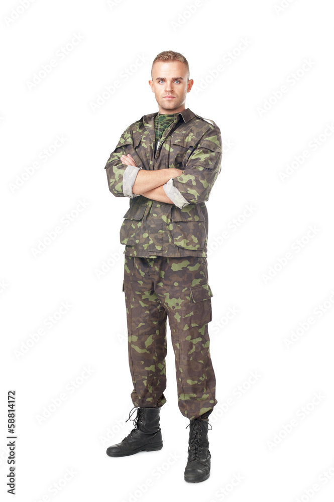 Full length portrait of serious army soldier with his arms cross Full length portrait of serious army soldier with his arms cross