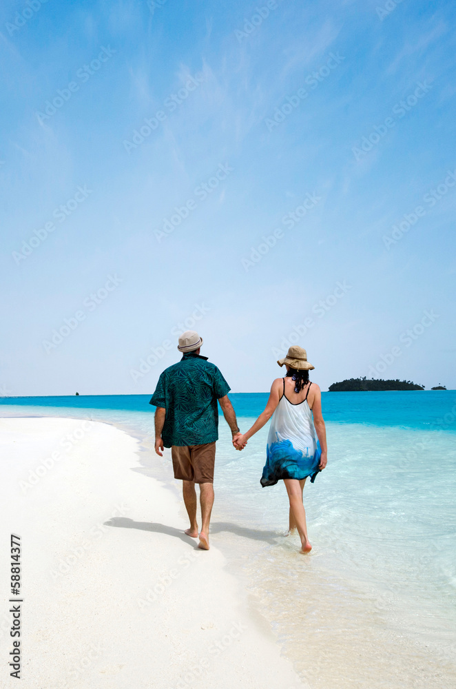 Young couple visit Aitutaki Lagoon Cook Islands Young couple visit Aitutaki Lagoon Cook Islands
