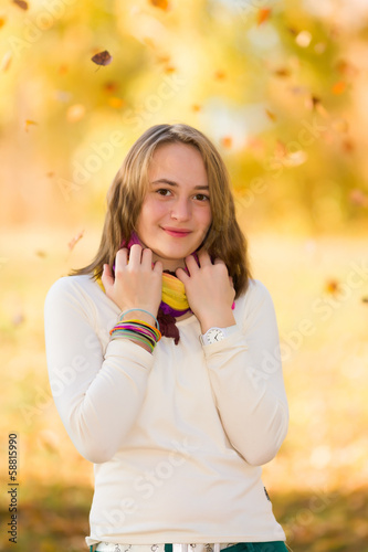 Cute teenager outdoors in autumn