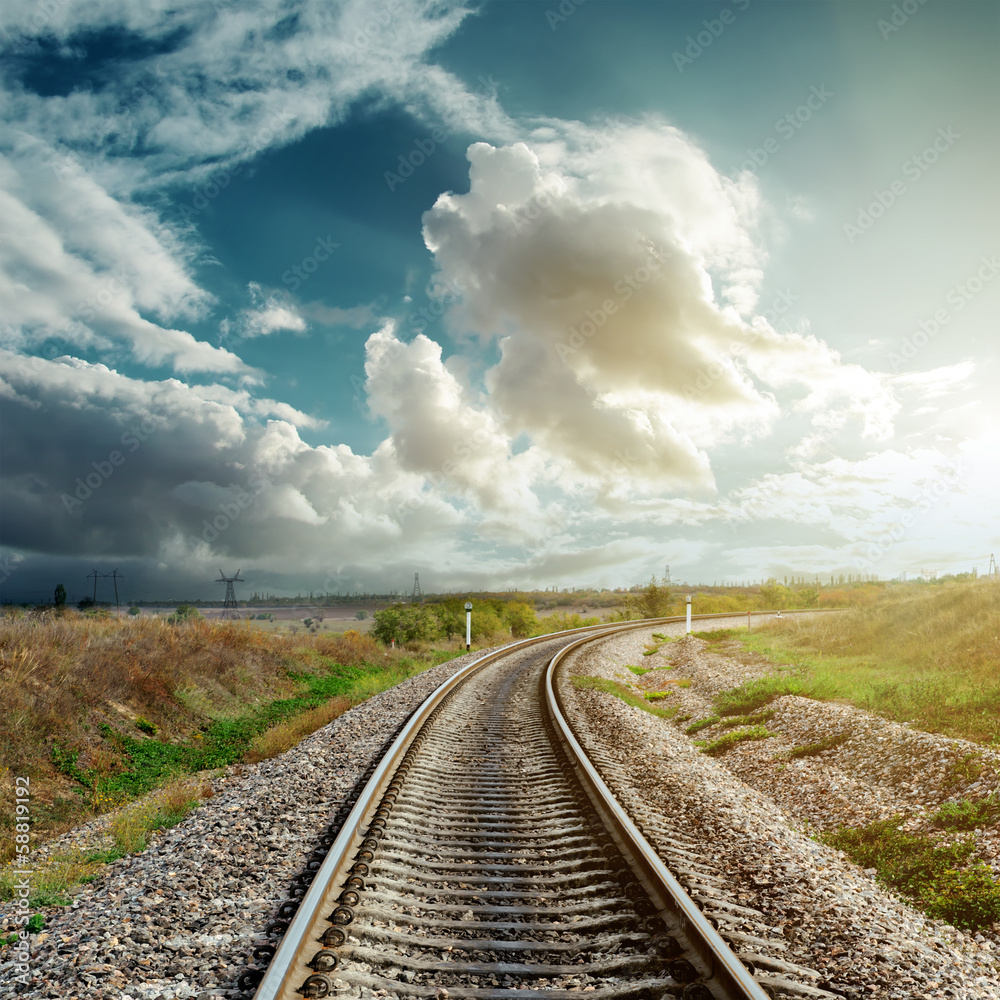 Fototapeta premium railroad goes to cloudy horizon
