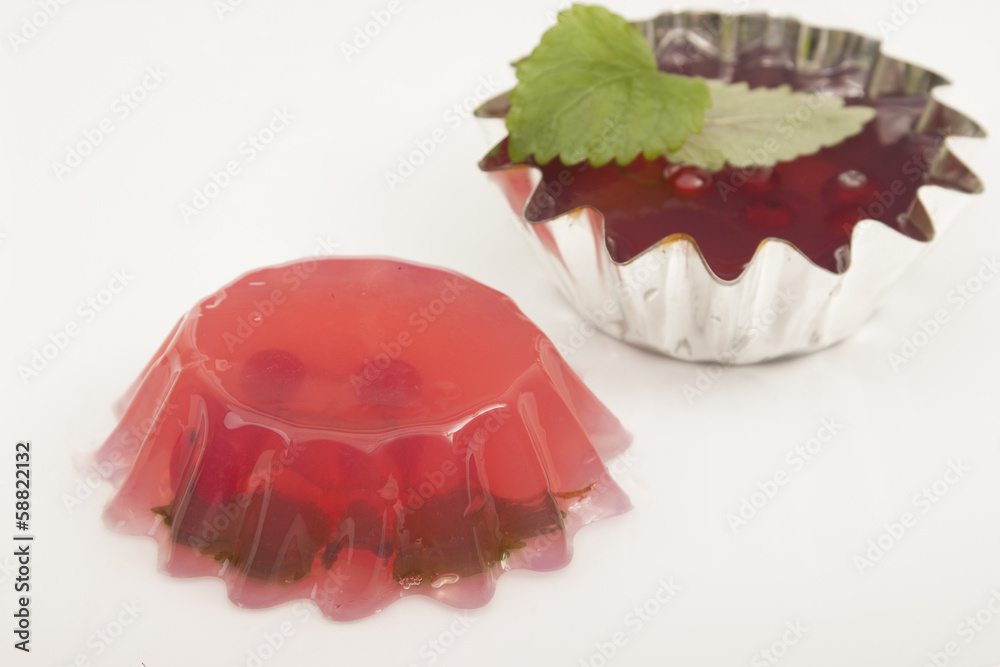 Red currant jelly with lemon balm leaves. Red currant jelly with lemon balm leaves.