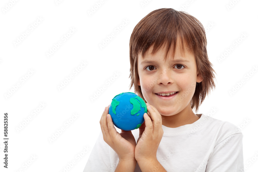 Happy kid holding earth globe made of clay Happy kid holding earth globe made of clay