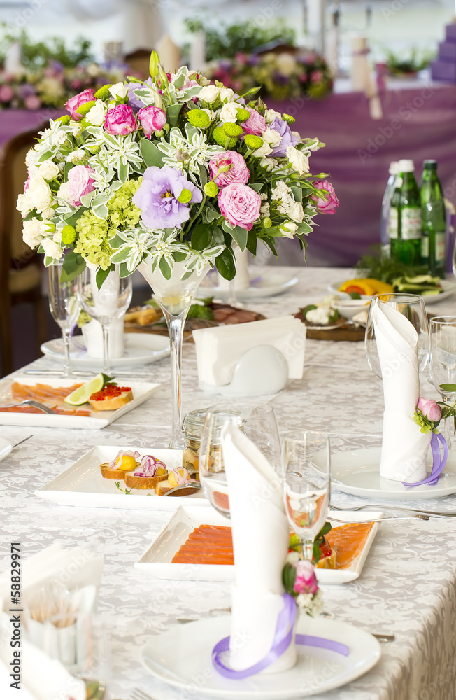 table ware glass glasses and fresh flowers