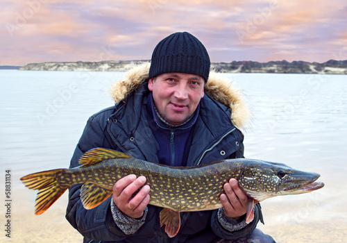 Man holding a pike