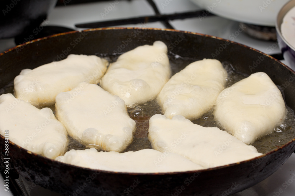 patties are fried in a pan patties are fried in a pan