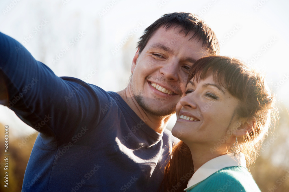 Couple pointing at something Couple pointing at something