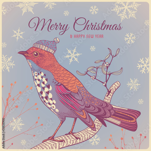 Christmas background with winter bird photo