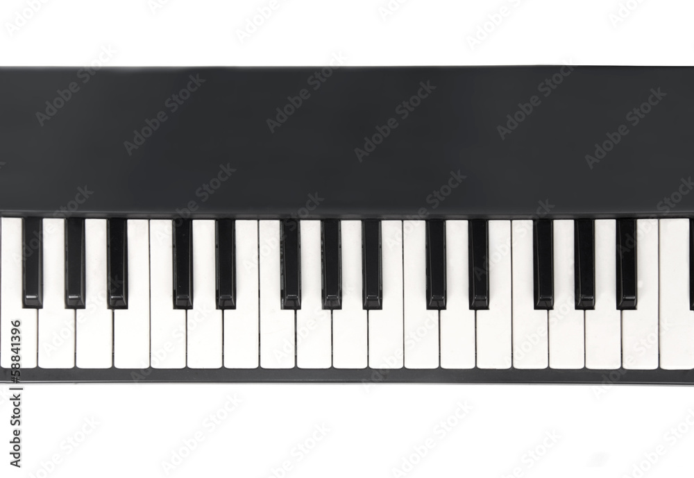 closeup view of piano keyboard isolated on white