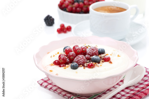 semolina porridge with fresh berries, nuts and coffee, isolated