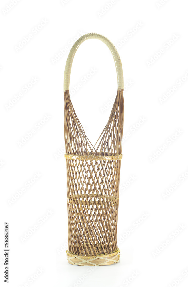 Obraz premium Wine bottle rattan basket isolated.