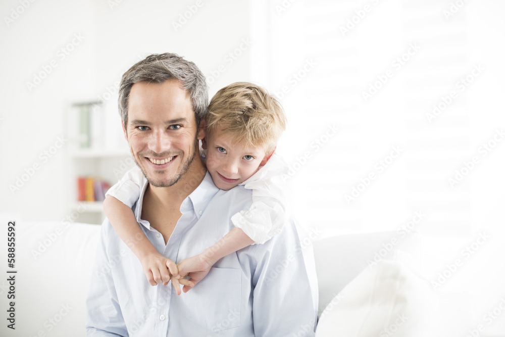 Fototapeta premium Father and his young son smiling