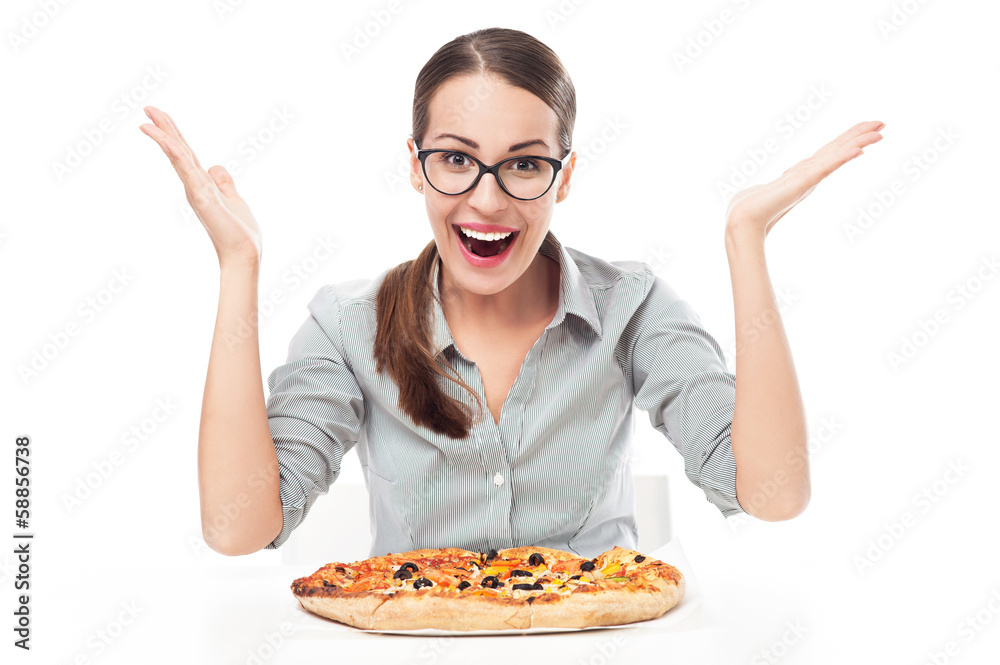 Happy woman eating pizza