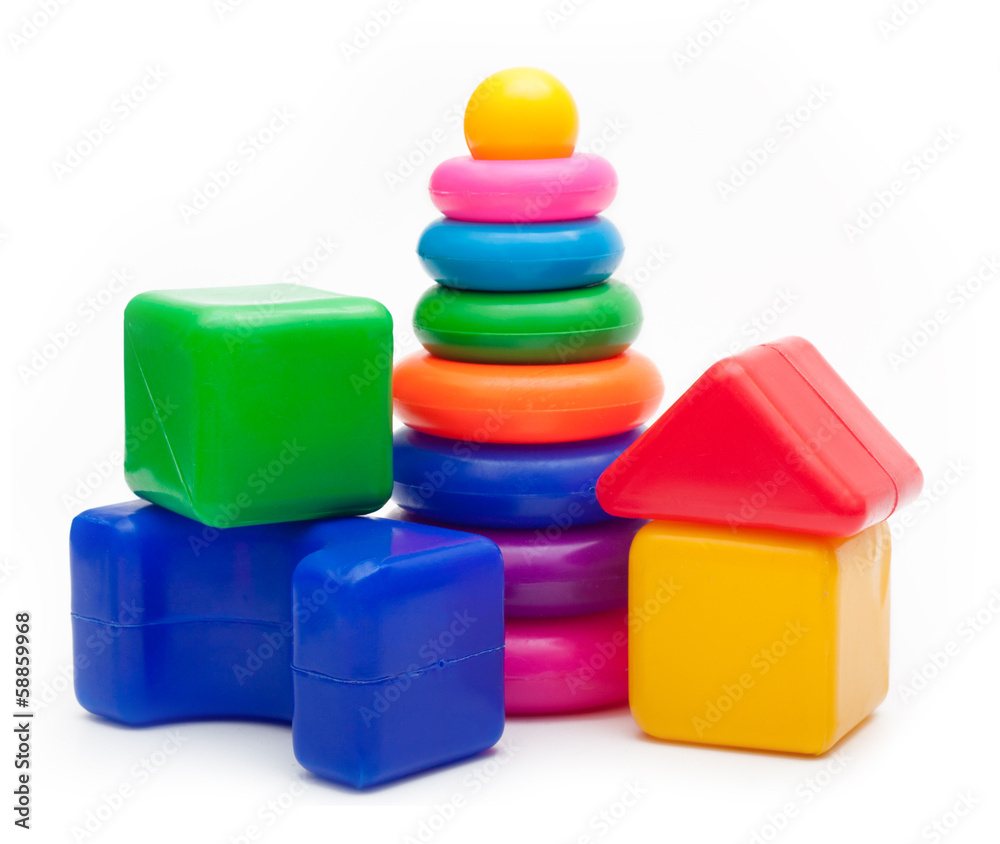 Toys isolated on white background. Pyramid build from colored Toys isolated on white background. Pyramid build from colored