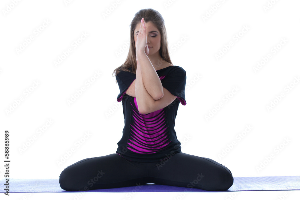Image of meditating brunette isolated on white Image of meditating brunette isolated on white