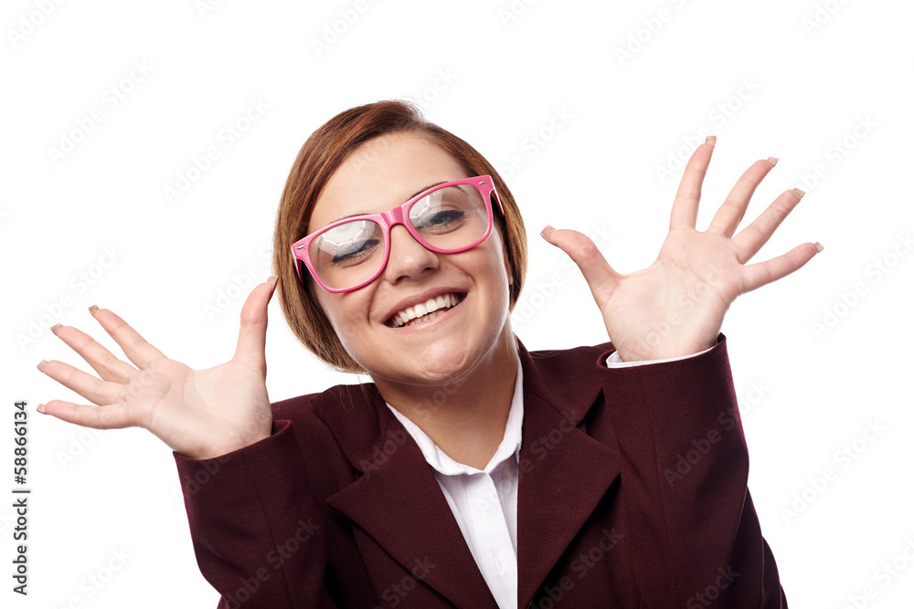 Woman wearing nerg glasses and making funny faces Woman wearing nerg glasses and making funny faces