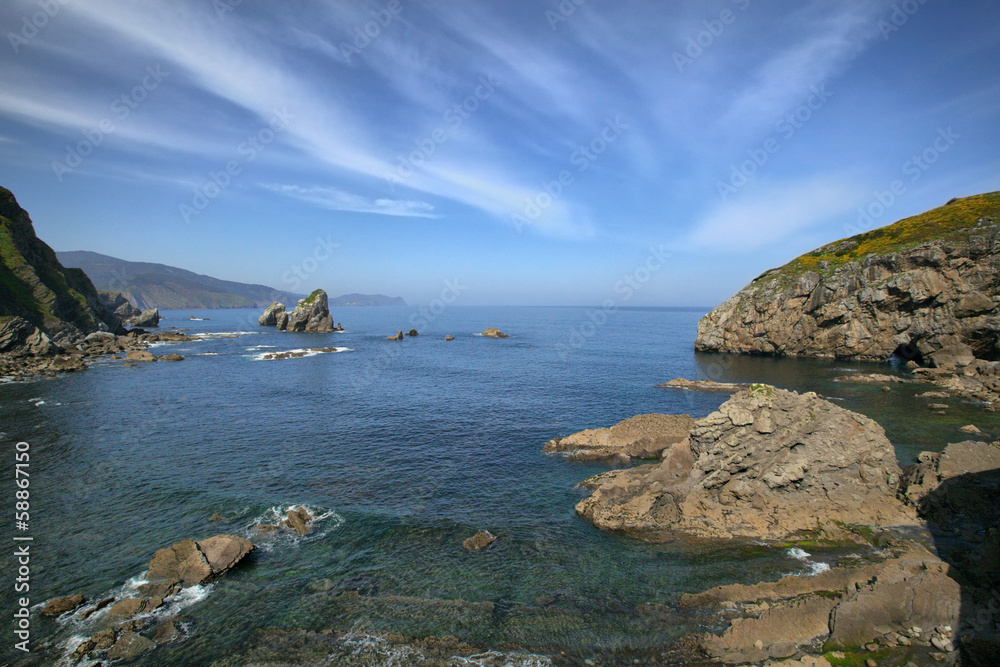 Rocks in sea near the island Gaztelugatxe, Spain