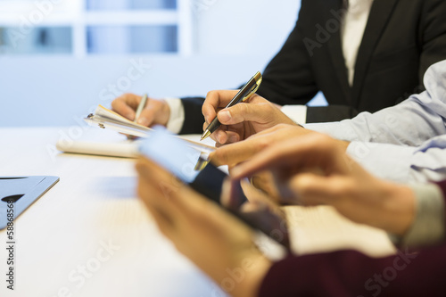 Close-up of Businessman hands working with document during a mee
